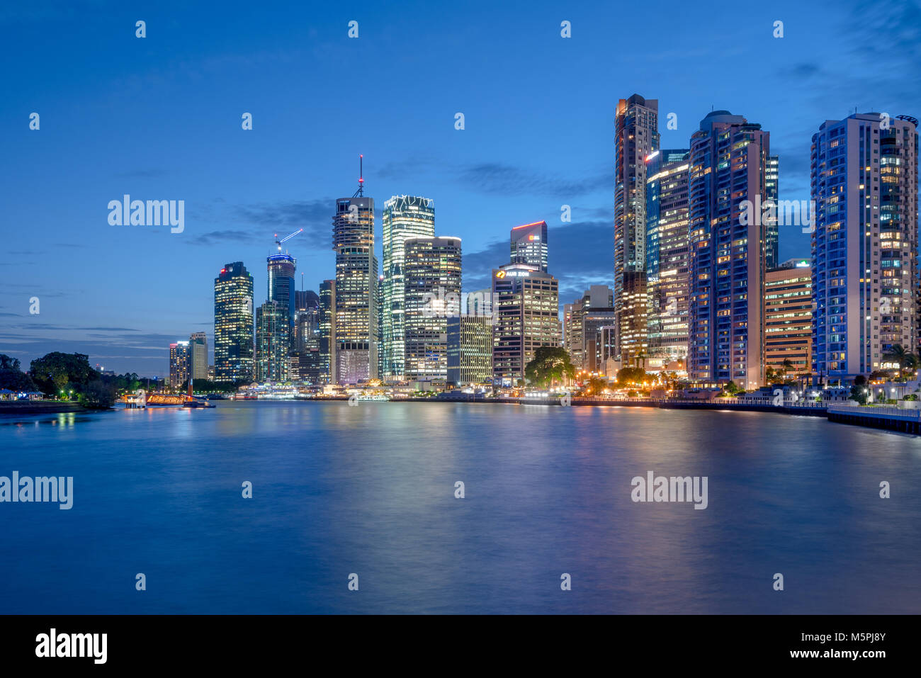 Night Brisbane, Queensland, Australia. Central Business District on banks of Brisbane River viewed at night Stock Photo