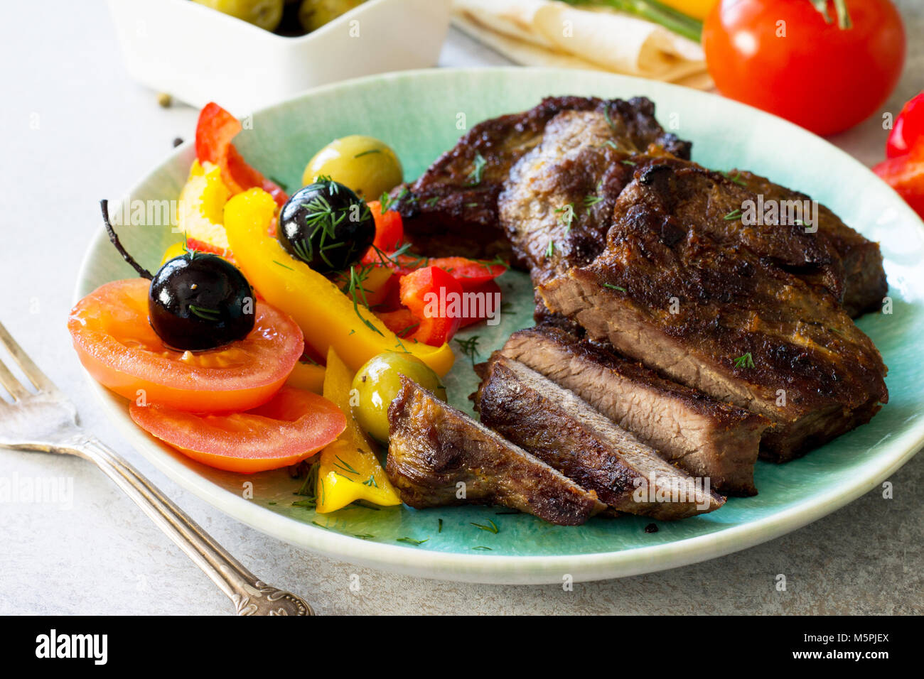 Appetizing barbecue steak from beef sirloin full roast served with