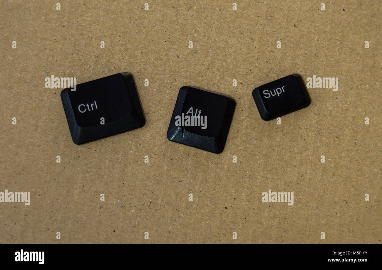 Isolated black keys of a keyboard: Ctrl + Alt +Supr. Shortcut in computing, concept of restore or restart during locks. Stock Photo