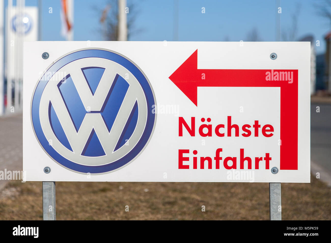 FUERTH / GERMANY - FEBRUARY 25, 2018: Volkswagen logo near a car dealer. Naechste Einfahrt means next entry. Volkswagen is a German automaker founded  Stock Photo