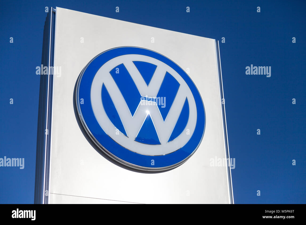 FUERTH / GERMANY - FEBRUARY 25, 2018: Volkswagen logo near a car dealer. Volkswagen is a German automaker founded on 28 May 1937 and headquartered in  Stock Photo