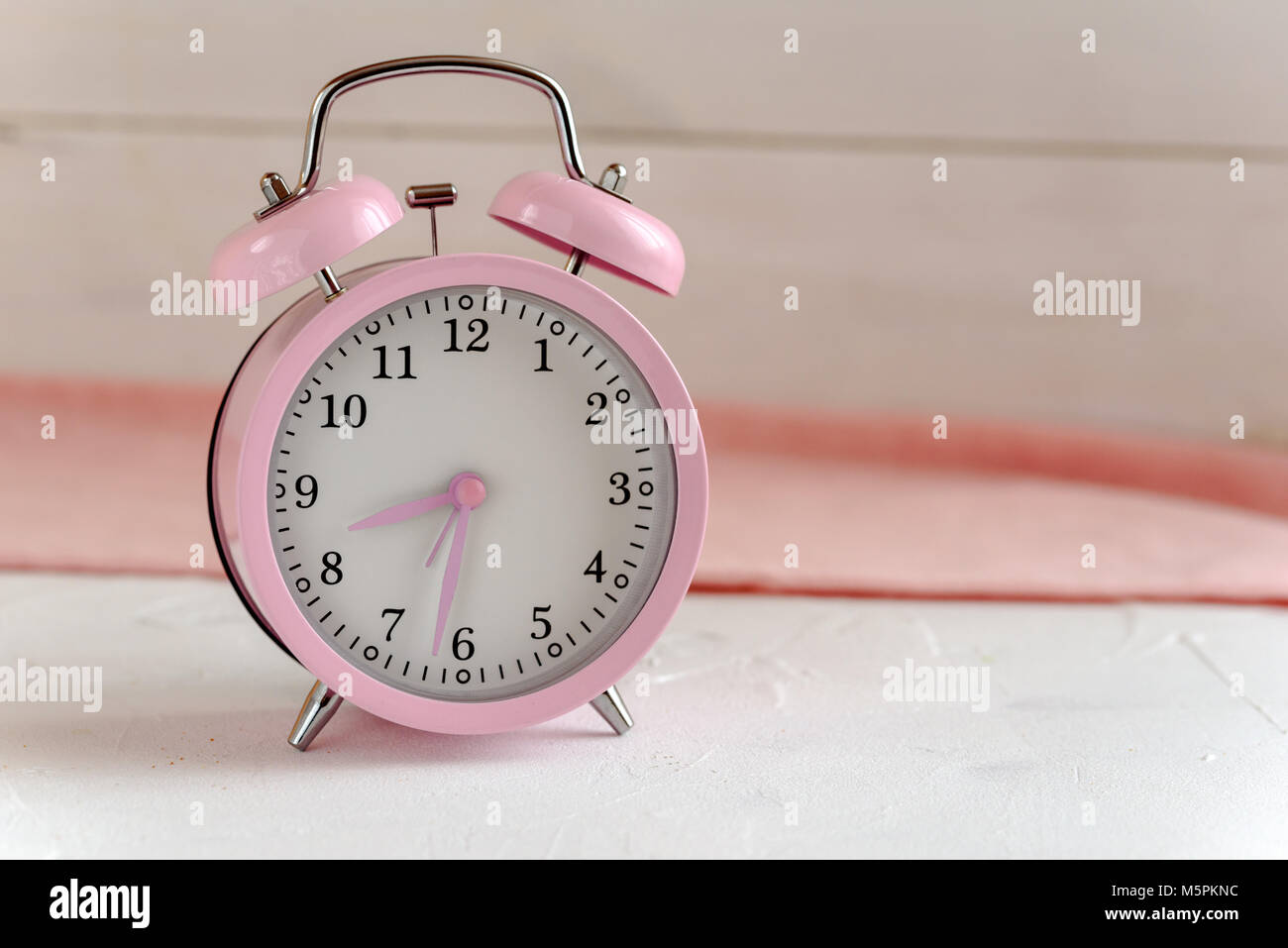 Pink alarm clock Stock Photo Alamy