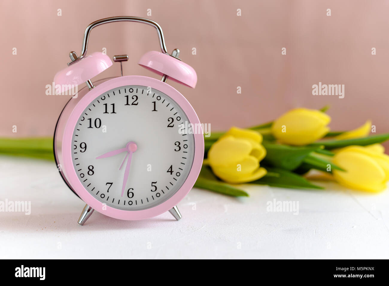 Pink alarm clock Stock Photo Alamy