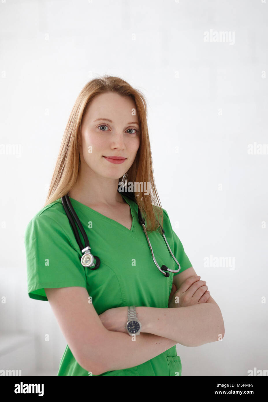 Portrait Of Friendly Smiling Female Doctor Healthcare Professional