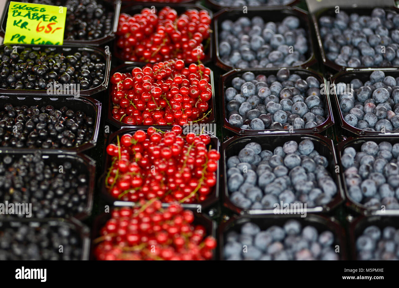 Variety of berries (blackberry, red berry, blueberry) for sale, Fish Market  - Fisketorget, Bergen, Norway Stock Photo