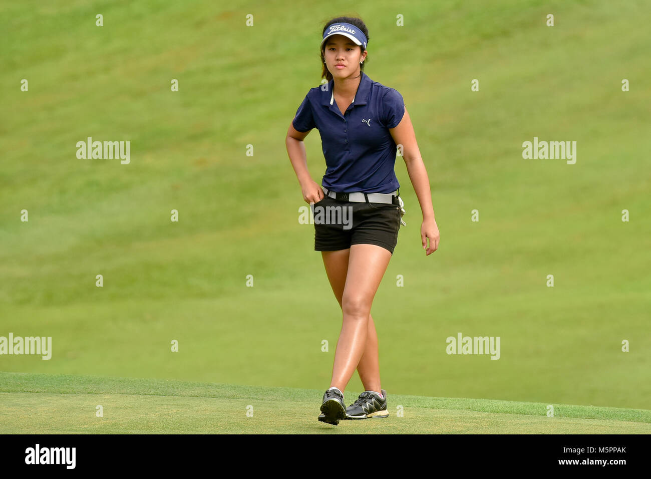 Danau, UKM Bangi - FEBRUARY 11: Audrey Tan Wei Yen, walks across the18th green during Final Round of the Danau Junior Championship at Danau Golf Club  Stock Photo