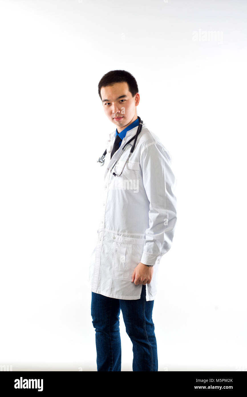 Portrait of friendly Asian male doctor on white. The man the doctor on a white background Stock Photo