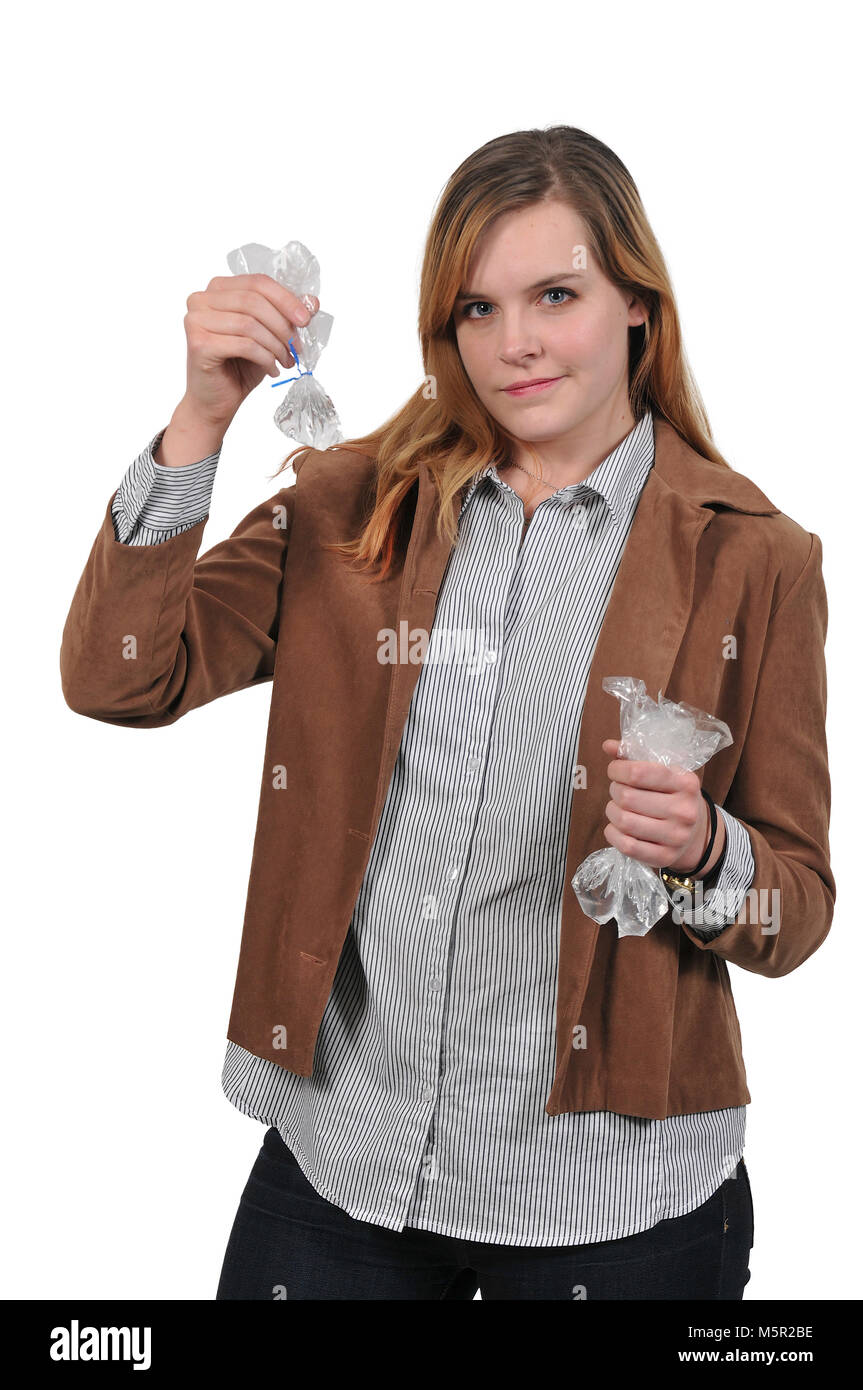 Woman illegally price gouging on a sale of water rations Stock Photo