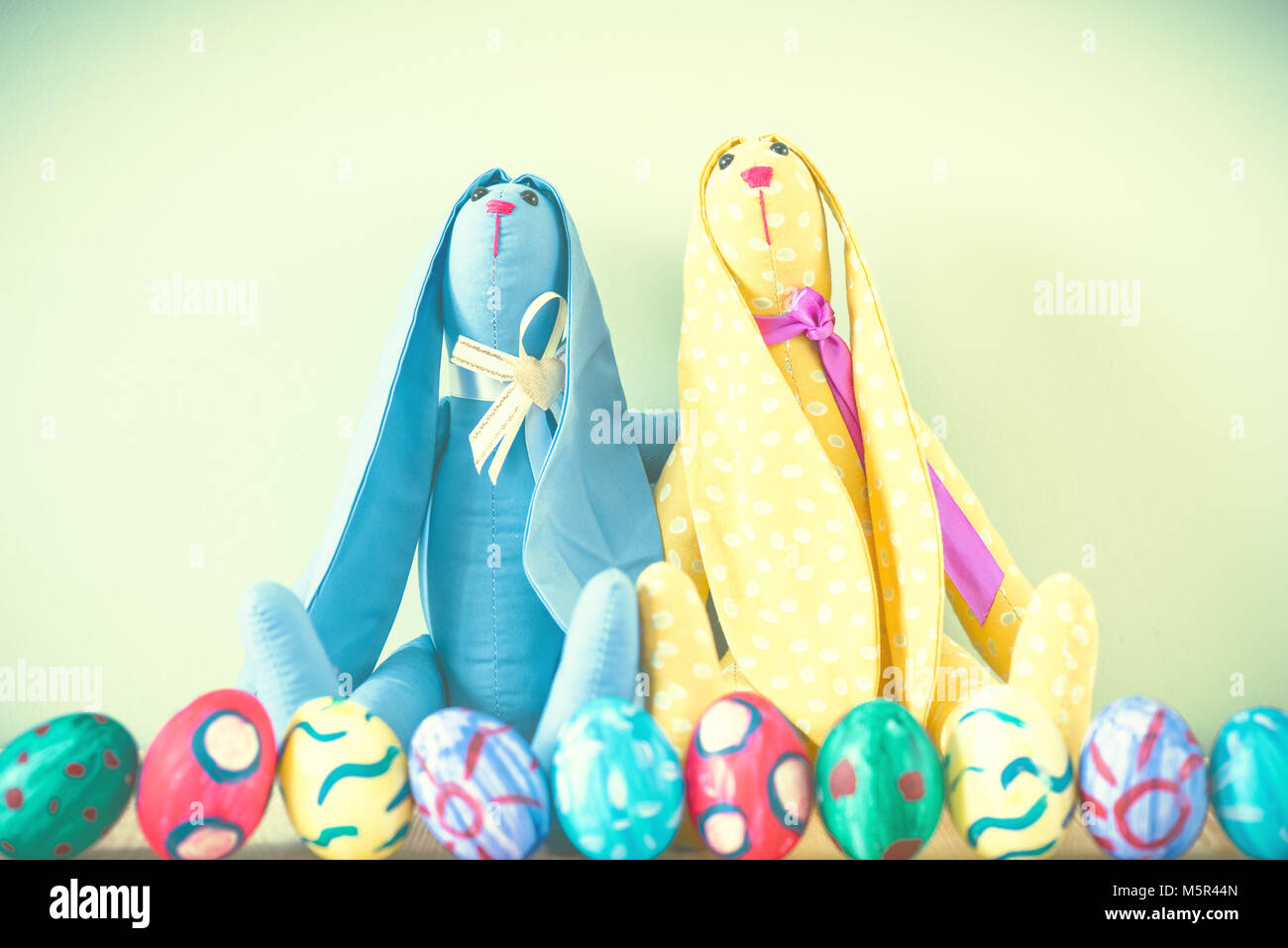 Easter bunnies on a green background Stock Photo
