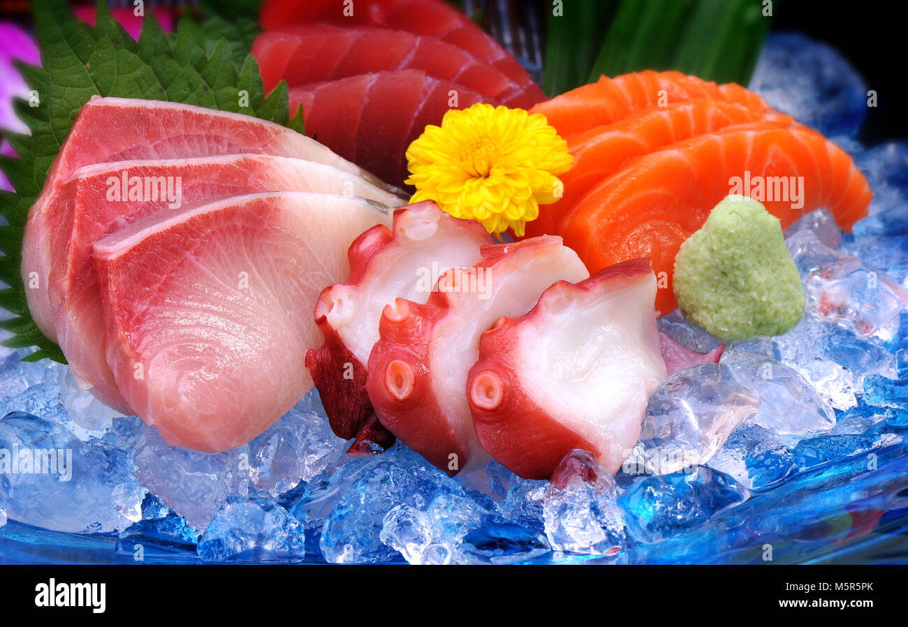 Japanese Mix sushi on ice and get four kind Hamachi Salmon Tako and