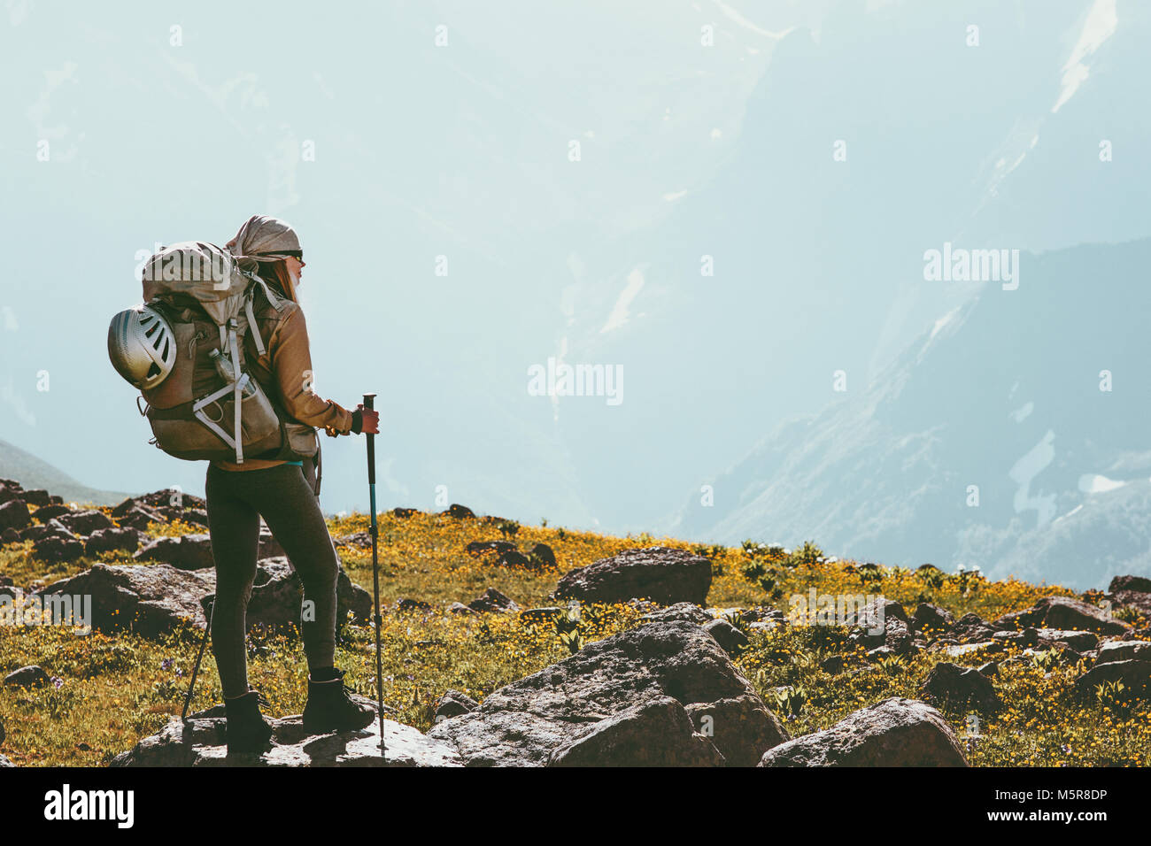 Woman trekking with backpack adventure Travel healthy Lifestyle concept outdoor active summer vacations Stock Photo