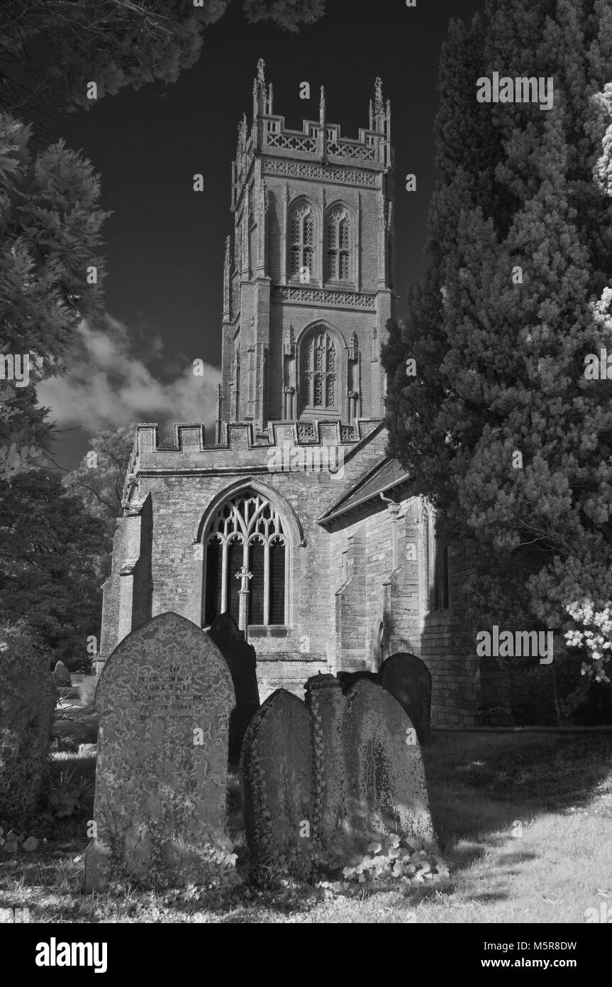 infrared picture of the Grade 1 listed church of St Mary in Huish Episcopi, near Langport in Somerset, England, UK. Including part of the churchyard Stock Photo