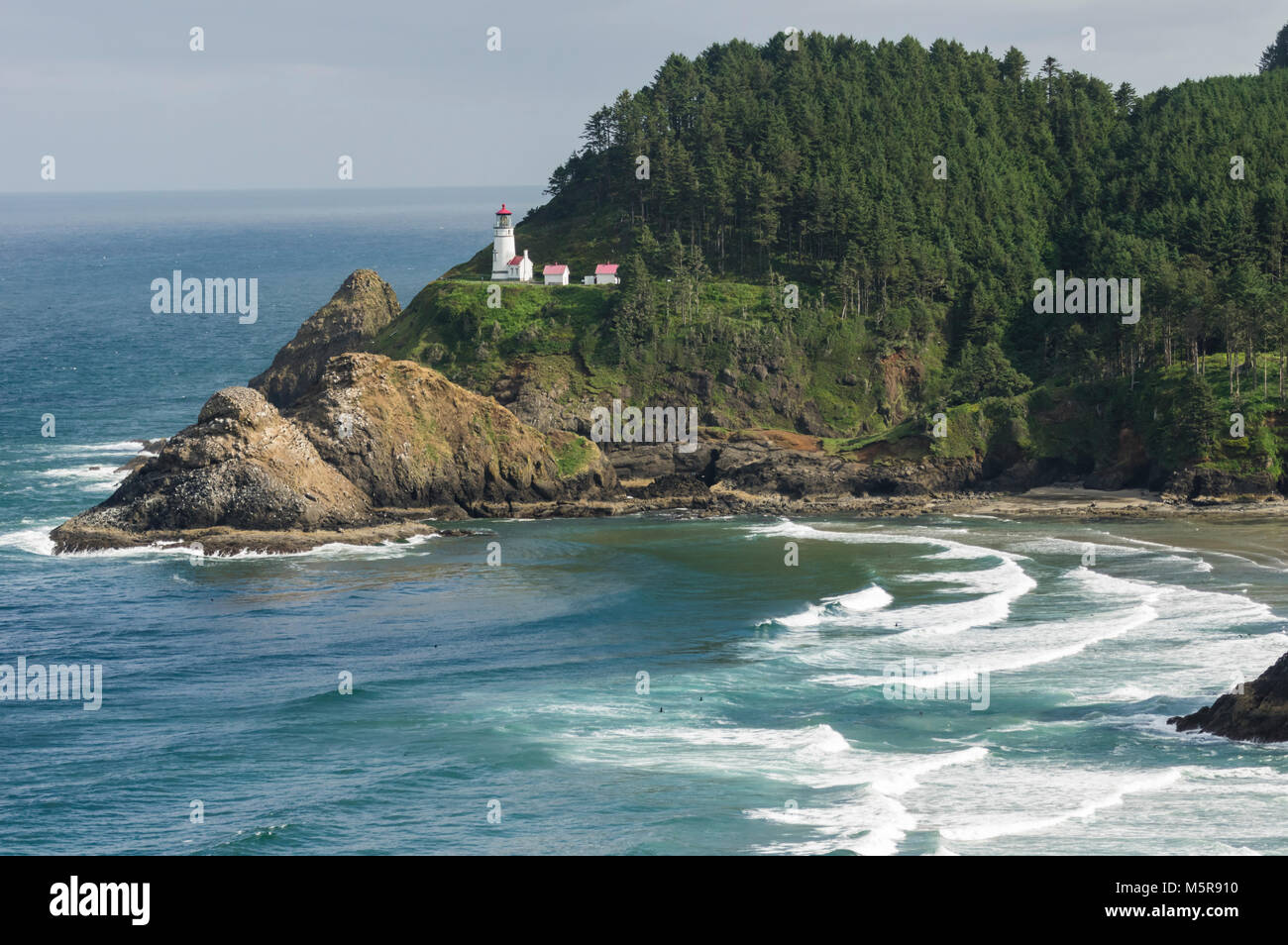 Heceta Head Lighthouse was constructed in 1892 - 1893 and opened in August of 1893.  The lighthouse itself is 56 feet tall and the light is the strongest on the Oregon coast. Stock Photo