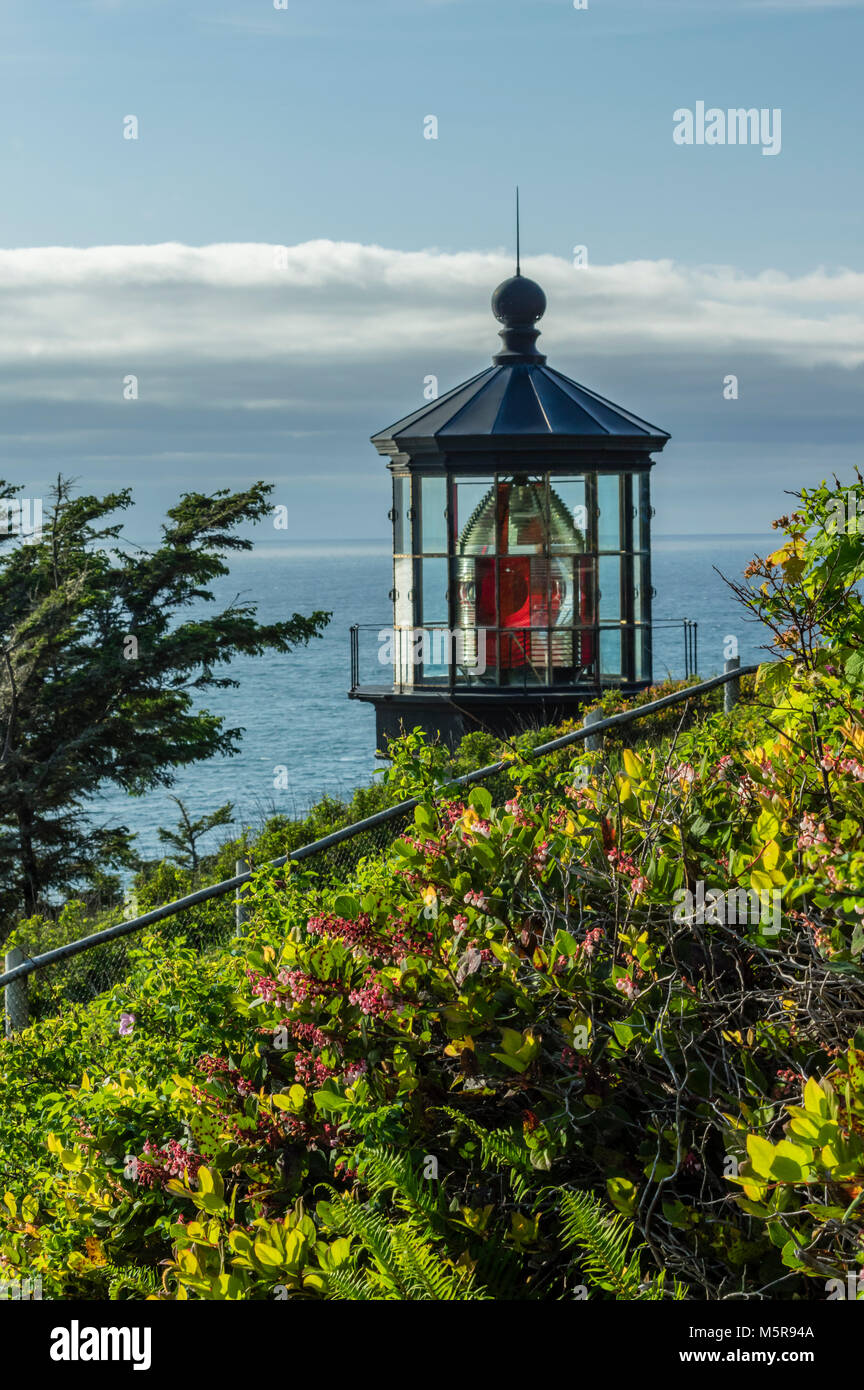 The Cape Meares Lighthouse opened in 1890 and served until 1963 when it was retired and replaced with new automated tower.  The site is now owned by the Oregon State Parks Department. Stock Photo