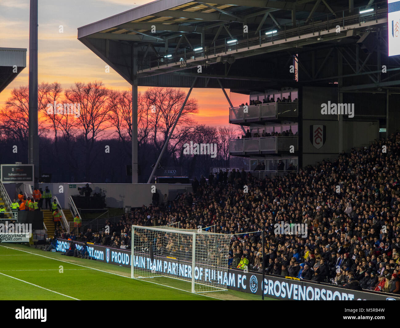 A lovely sunset at Craven Cottage prior to the start of a match Stock Photo