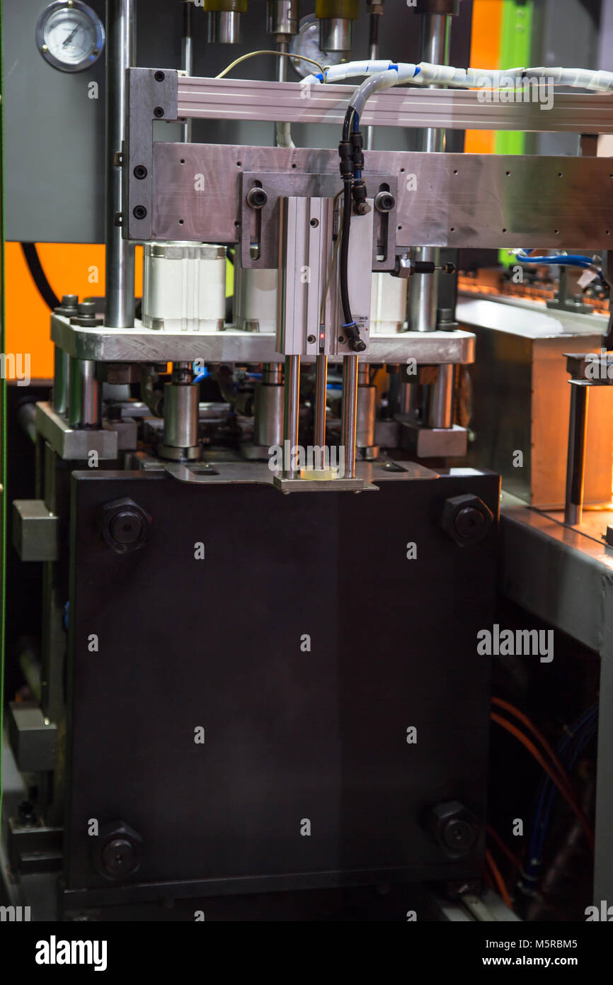 Heating process for plastic bottle blowing machine Stock Photo Alamy