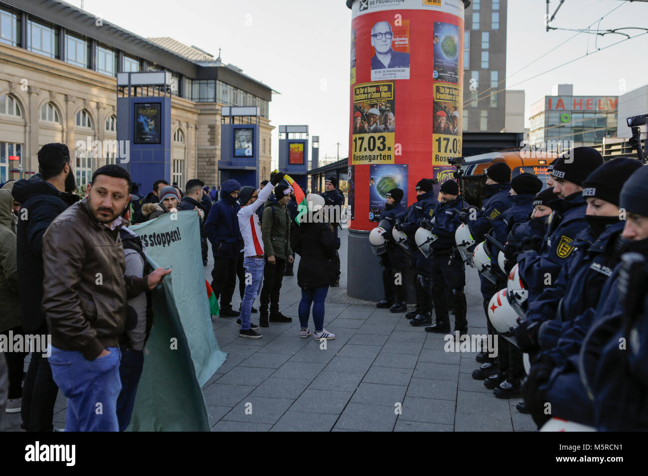 Mannheim, Germany. 25th Feb, 2018. Riot police officers stand in front