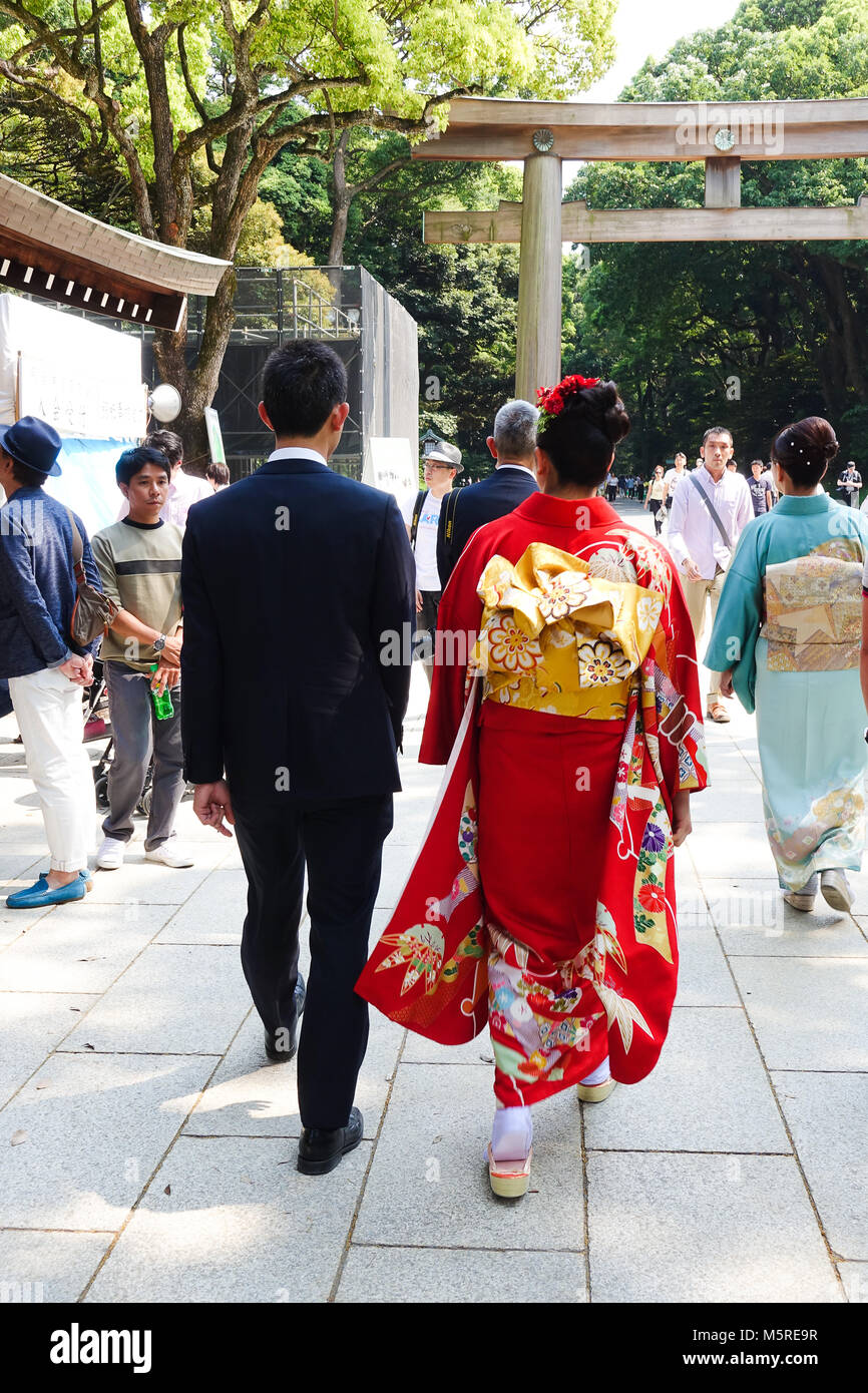 A couple wearing traditional attire in Yoyogi Park. Stock Photo