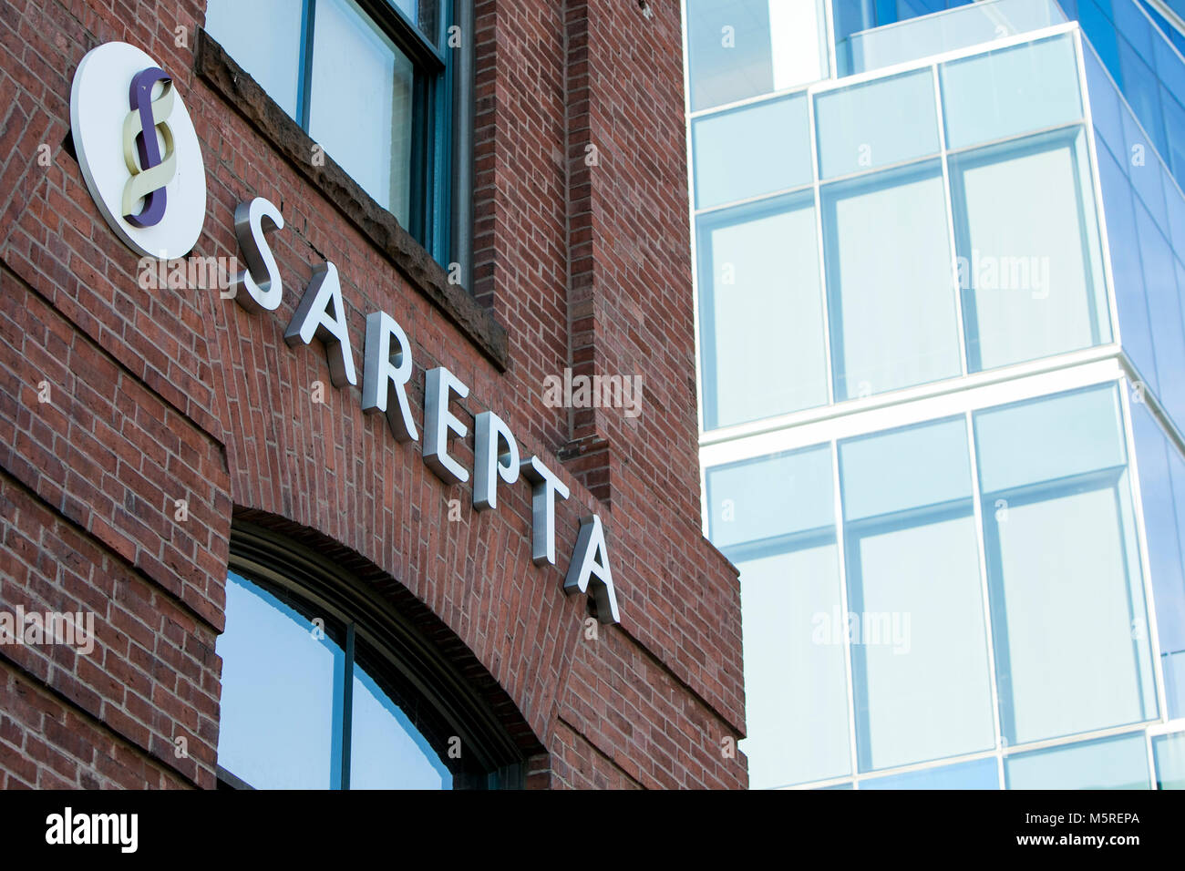 A logo sign outside of the headquarters of Sarepta Therapeutics, Inc