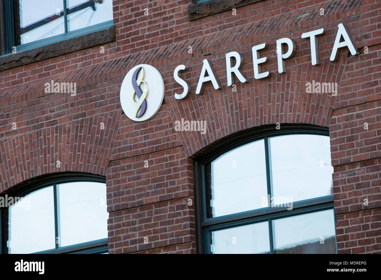A logo sign outside of the headquarters of Sarepta Therapeutics, Inc