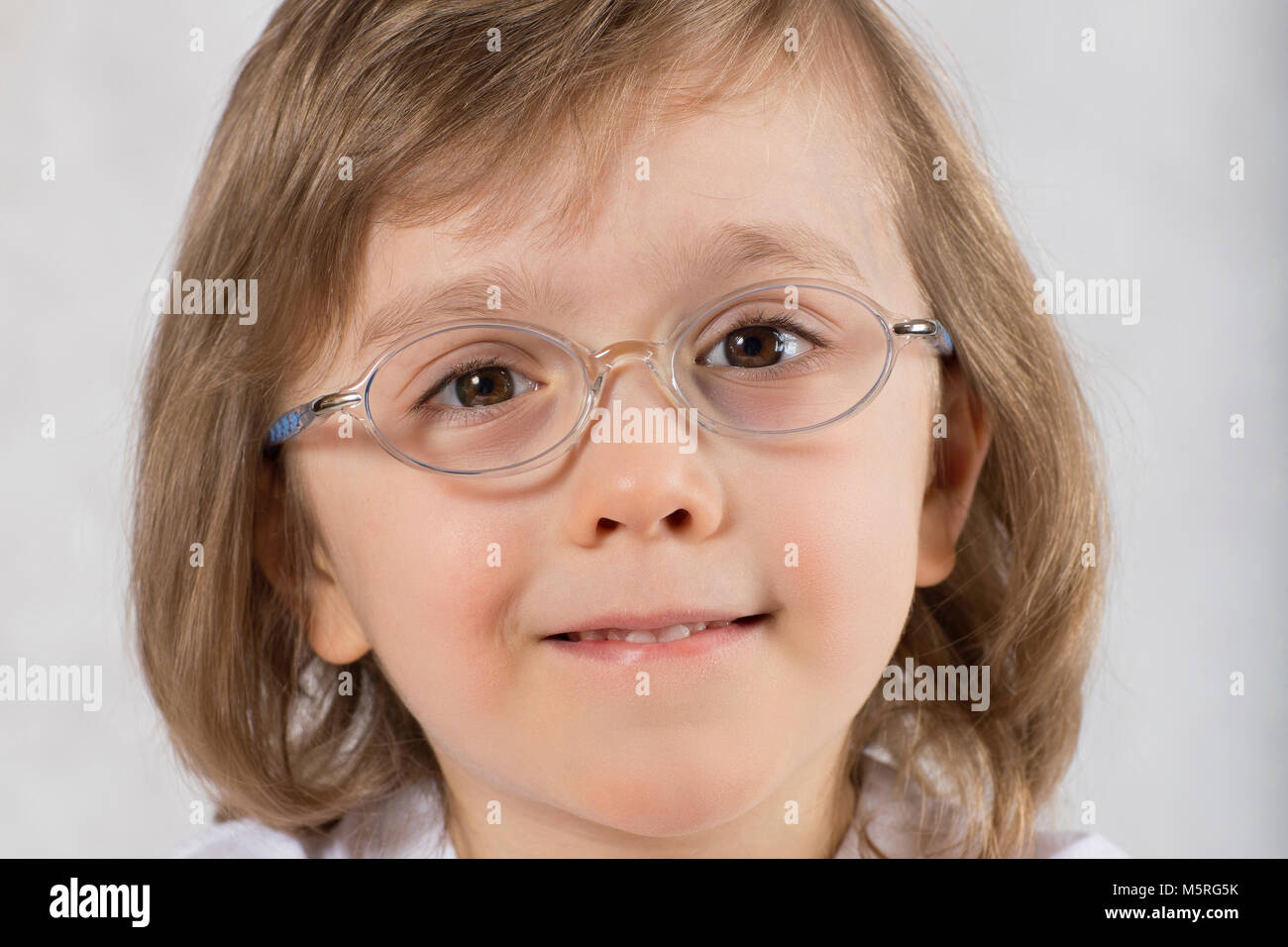 Boy of five years old in eyeglasses. Closeup Stock Photo Alamy