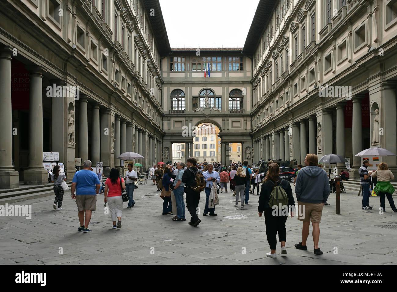 Tourists in the gallery Uffizi in the historic centre of Florence - Italy. Stock Photo