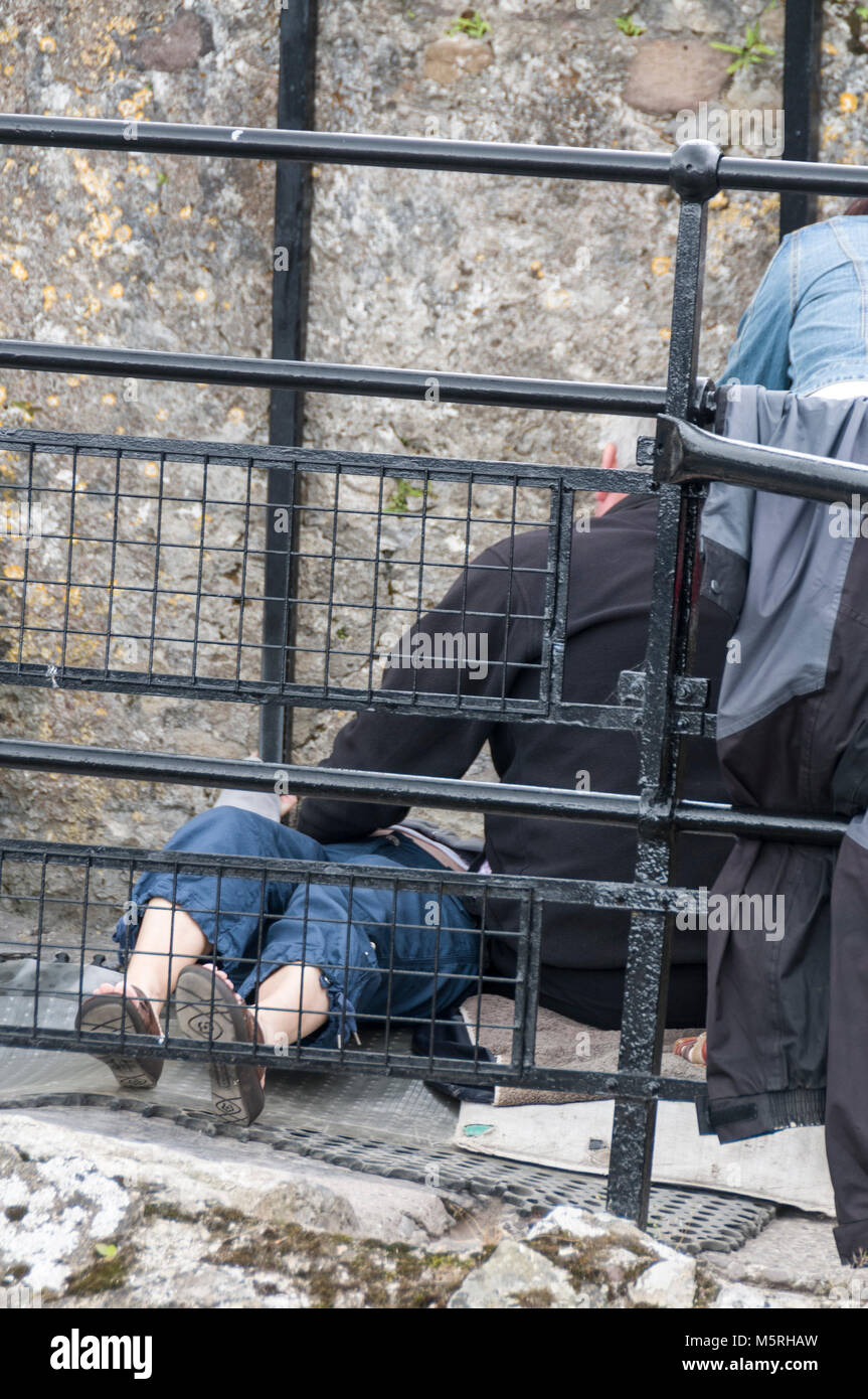 Visitors queue to kiss the Blarney Stone at Blarney Castle in Southern Ireland Stock Photo