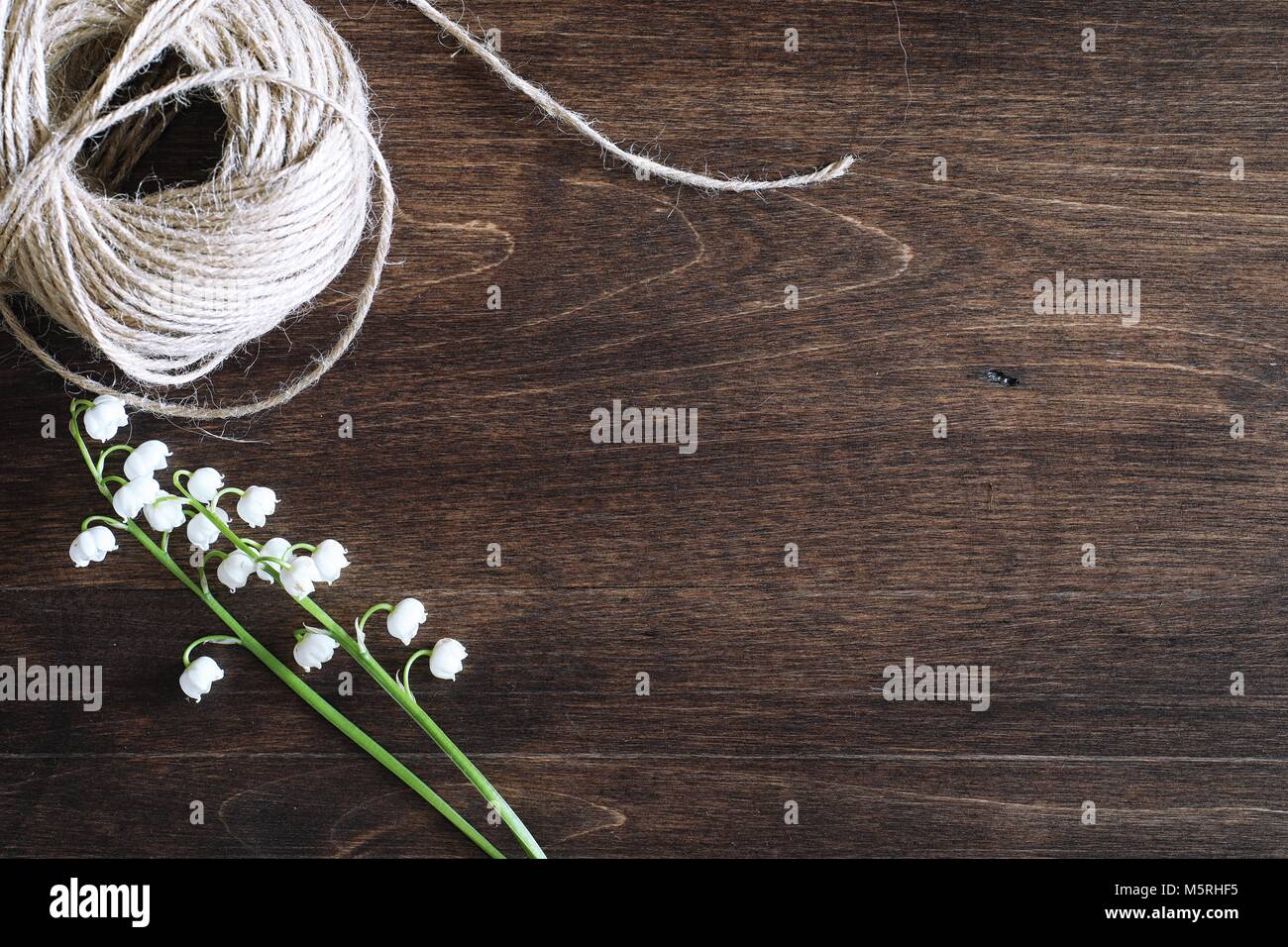 Bouquet of lilies of the valley on a table Stock Photo - Alamy
