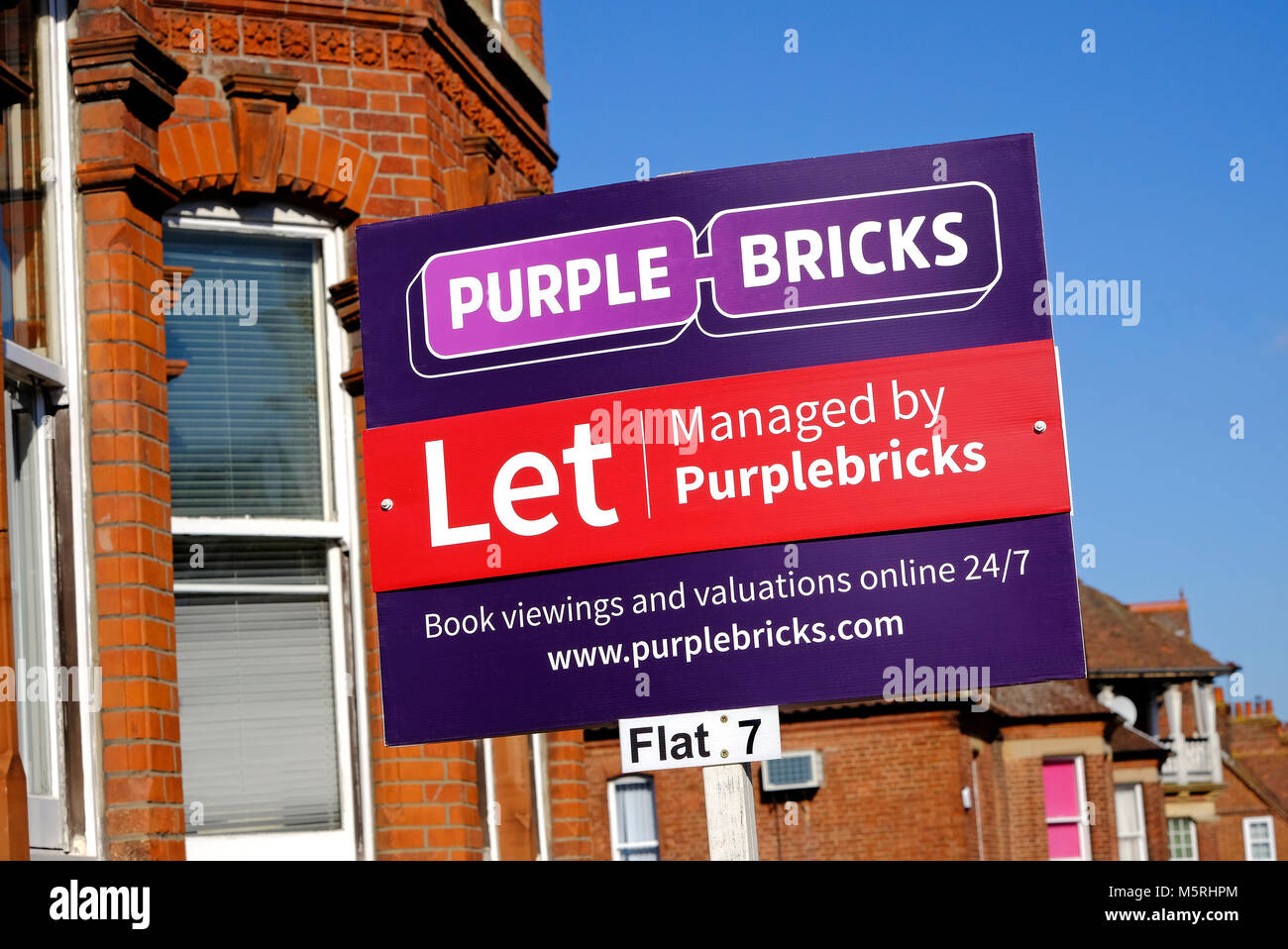 purple bricks on-line estate agents sign, norfolk, england Stock Photo
