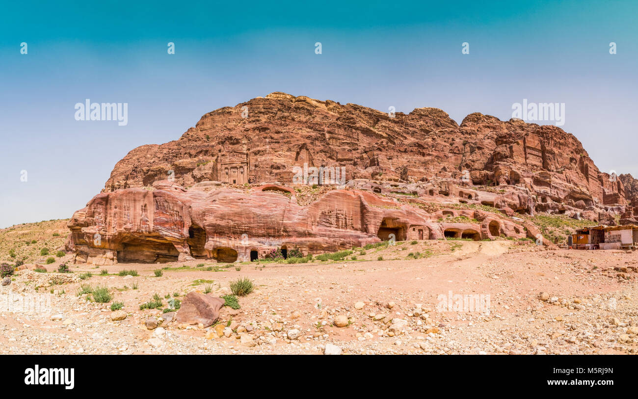 Cave dwellings in the Rose City of Petra, Jordan. The city of Petra was lost for over 1000 years. Now one of the Seven Wonders of the Word Stock Photo