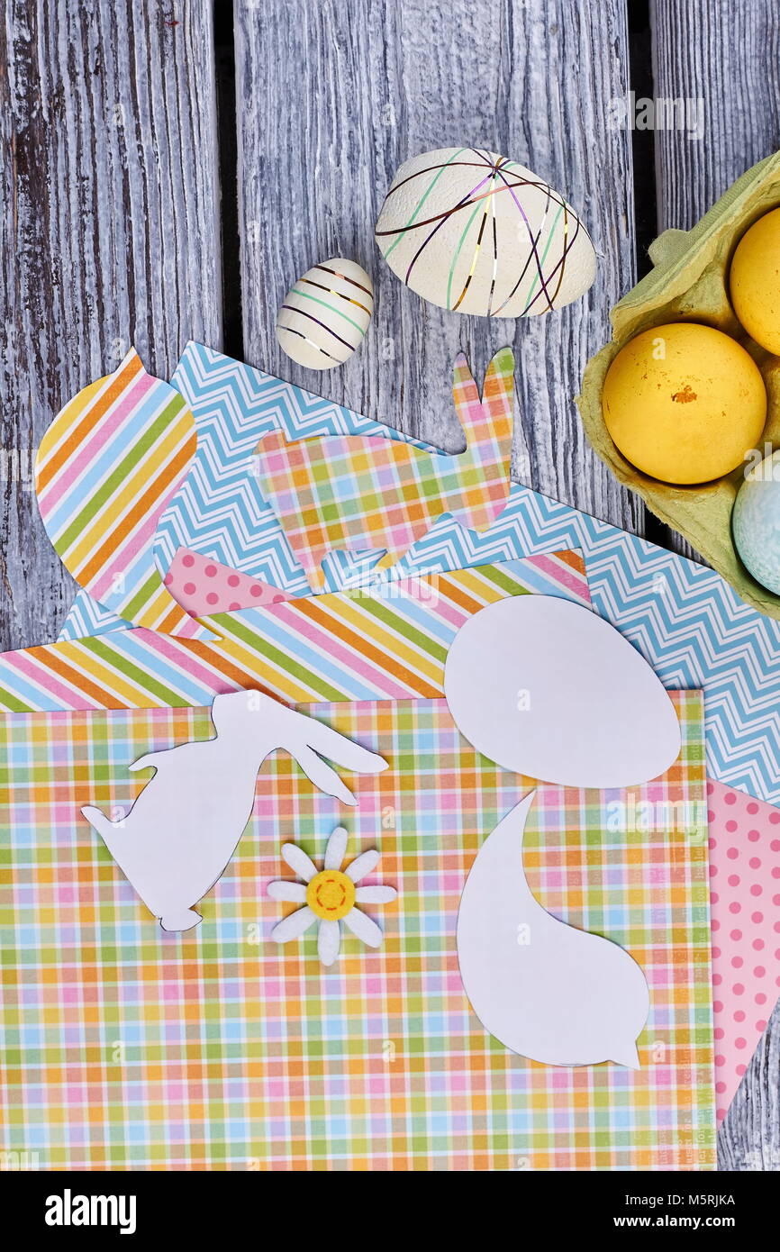 Styrofoam eggs and colorful sheets of paper Stock Photo Alamy