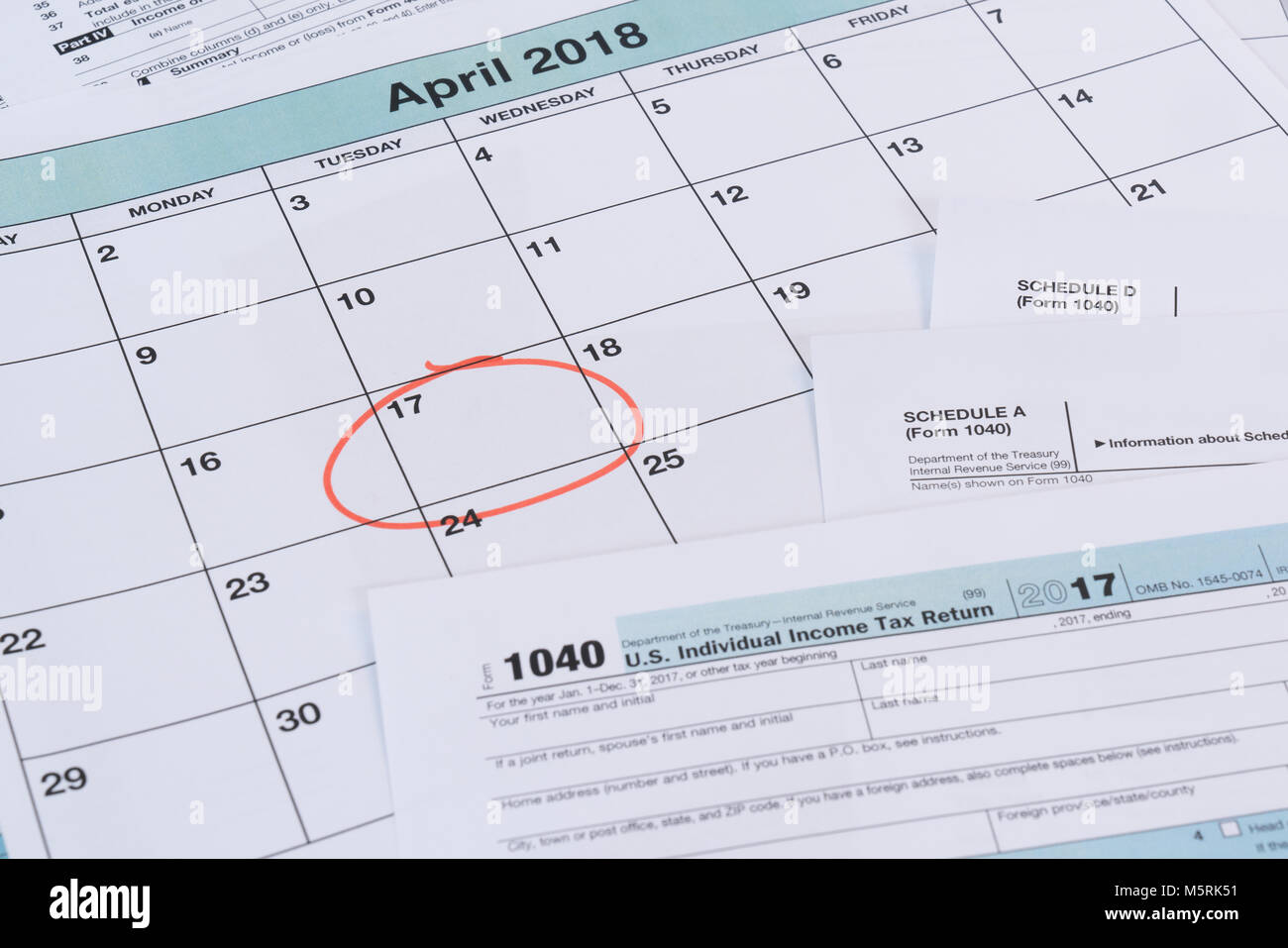 Calendar with reminder for taxes due on April 17th Stock Photo