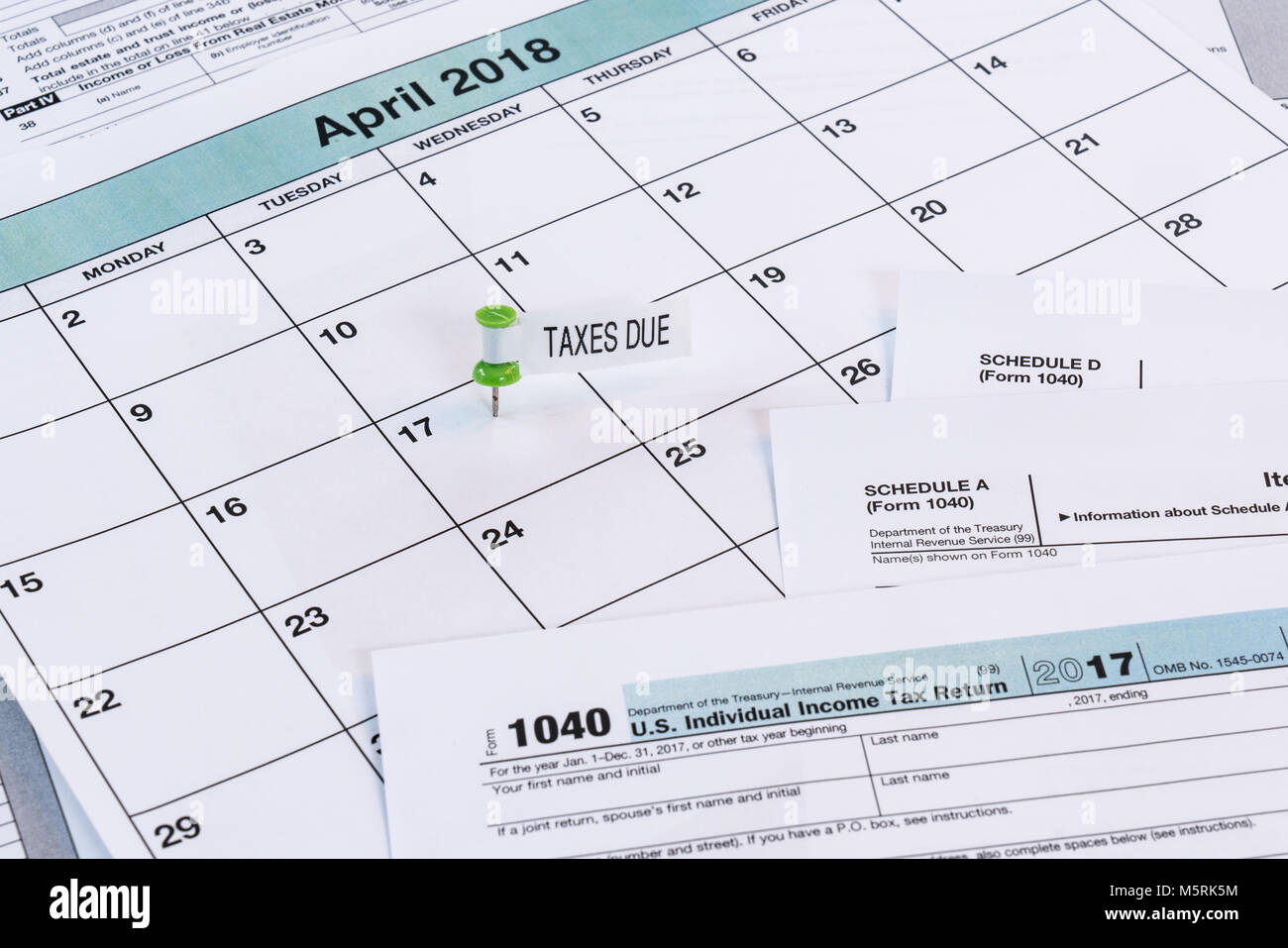 Calendar with reminder for taxes due on April 17th Stock Photo