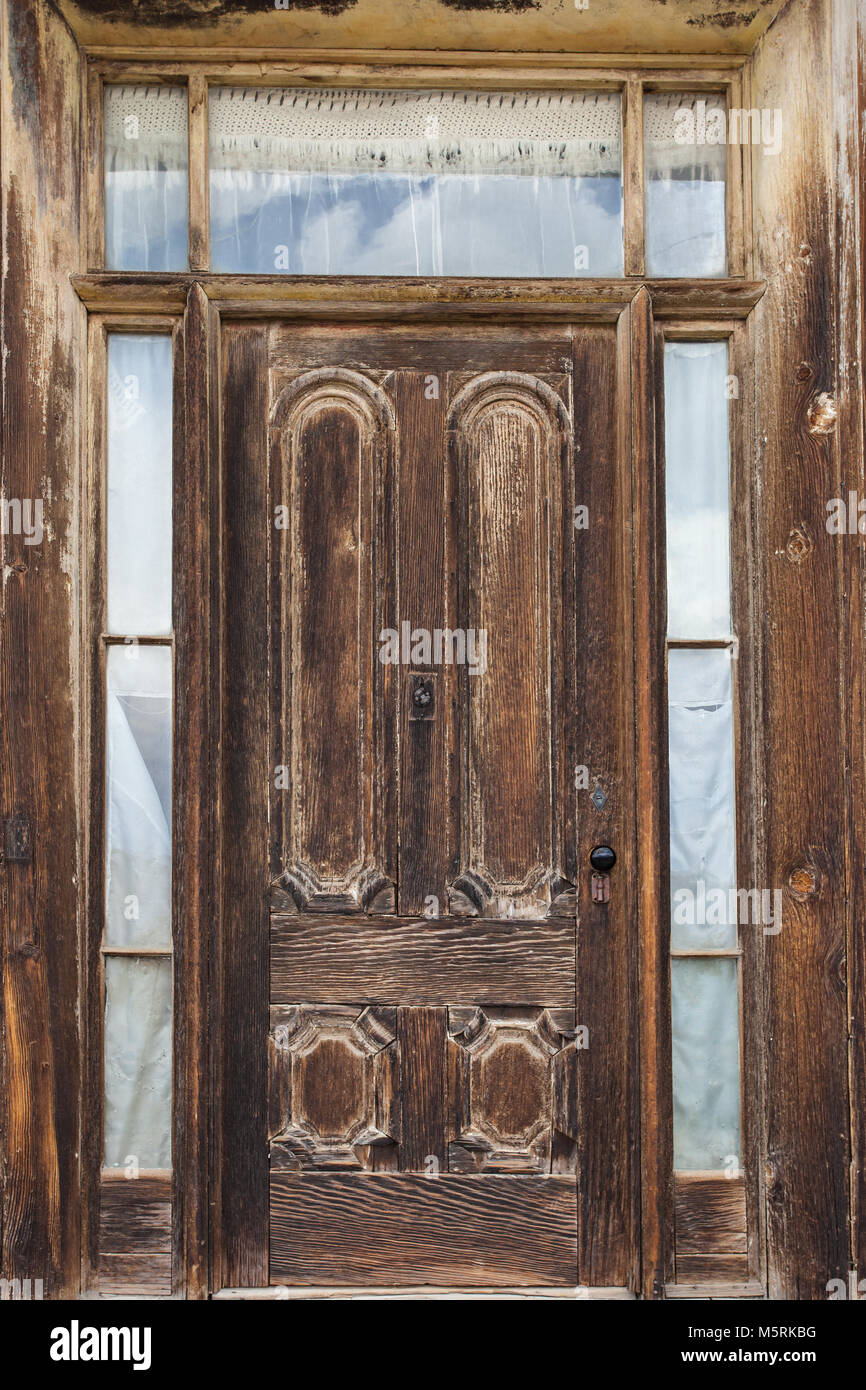 Old wooden door in the ghost town of Bodie, California Stock Photo