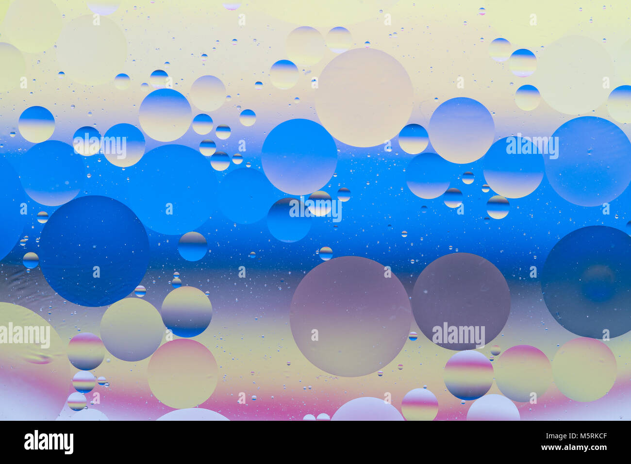 Colorful Bubble Spheres Background in Liquid Stock Photo