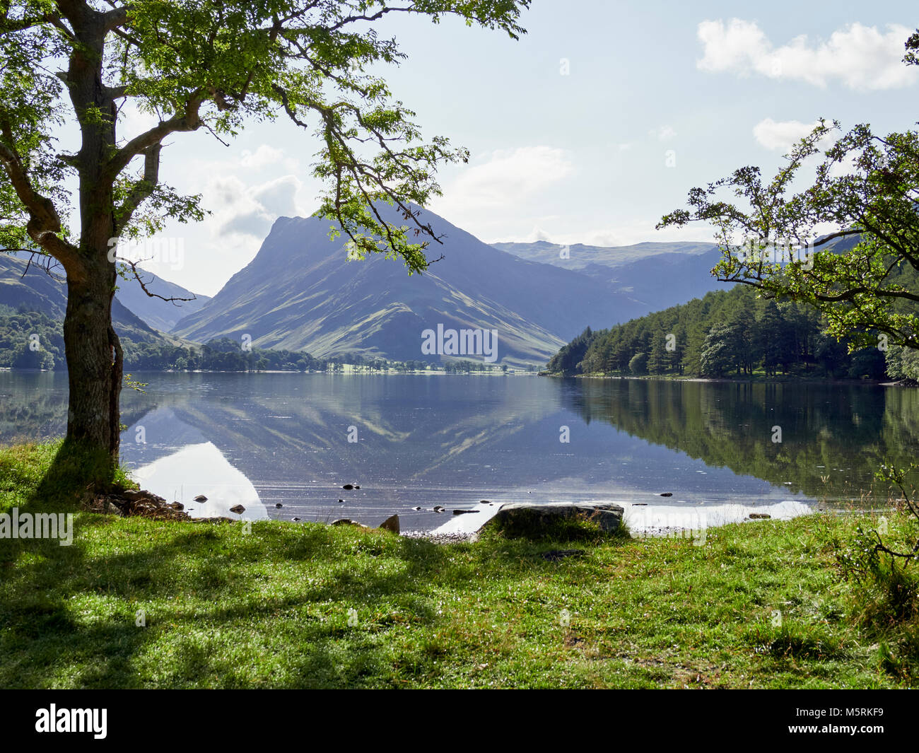 Views of Fleetwith Pike from the shore of Lake Buttermere in the English Lake District on a summers day, UK. Stock Photo