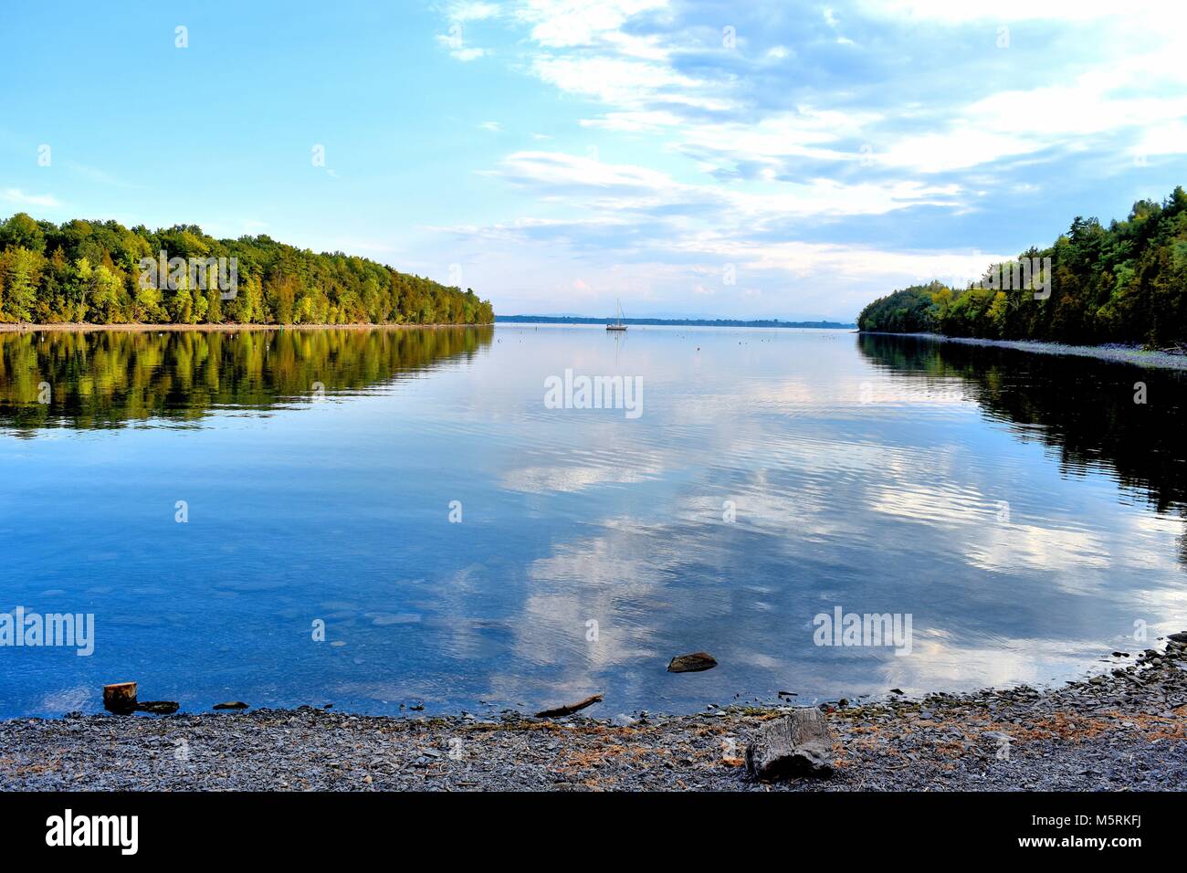 A calm bay stretches between two peninsulas in Point Au Roche State