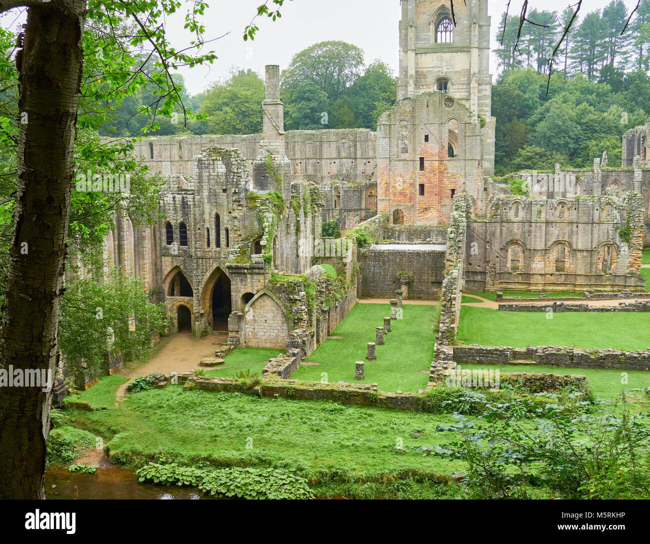 FOUNTAINS ABBEY,RIPON, ENGLAND, UK - SEPTEMBER 04, 2017: Cistercian Monastery grounds and ruins of Fountains Abbey in North Yorkshire, England, UK. Stock Photo
