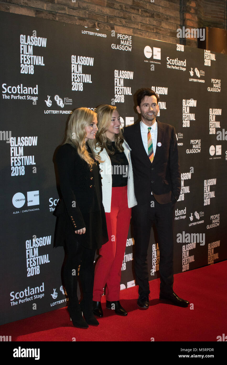 Glasgow, Scotland, UK. 25th February, 2018. Actor, David Tennant on the red carpet, with Georgia Moffett (Producer) and Daisy Aitkens (Director), at a photo call for the European film premiere of You, Me and Him, at the Glasgow Film Theatre (GFT), Scotland. You, Me and Him is 'a fizzy Bridget-Jones-style romp,' and co-starring are Faye Marsay and Lucy Punch. This screening is part of the Local Heroes strand at the Glasgow Film Festival 2018 (GFF), which runs until 4th March, 2018. Iain McGuinness / Alamy Live News Stock Photo