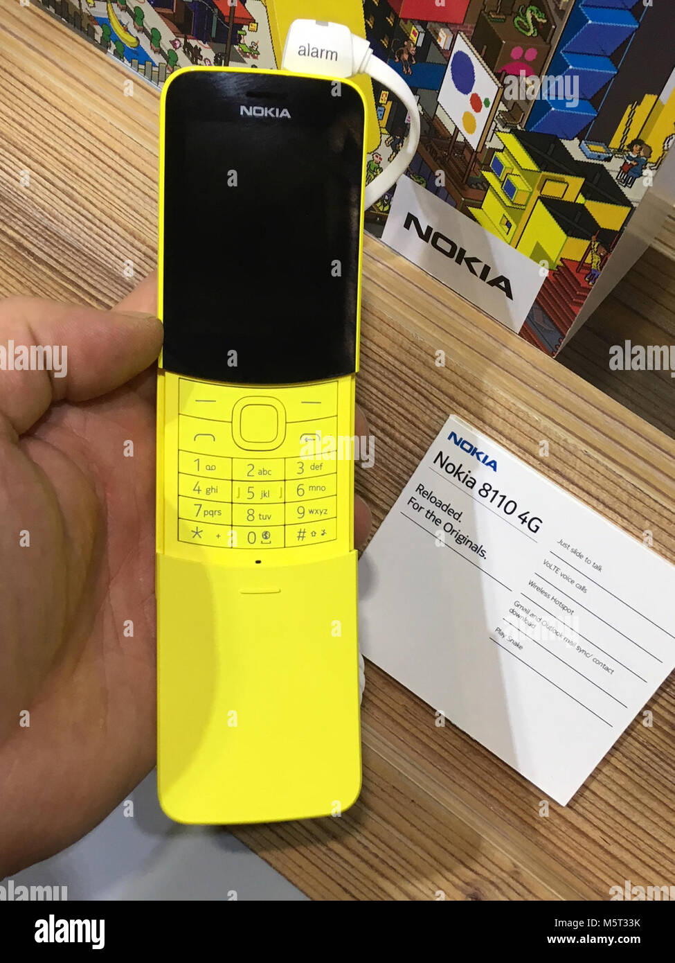 Barcelona, Spain. 26th Feb, 2018. A mobile phone Nokia 8110 in Banana Yellow color by HMD Global company is seen during the 2018 Mobile World Congress in Barcelona, Spain, on February 26, 2018. Credit: Jan Sadilek/CTK Photo/Alamy Live News Stock Photo