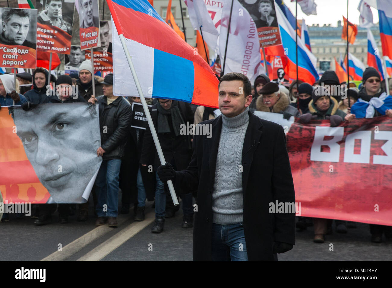 Moscow, Russia. 25th February 2018. Chairman of Moscow's Krasnoselsky District Council, opposition activist Ilya Yashin (front) takes part in a march in Moscow's Prospekt Akademika Sakharova Street in memory of Russian politician and opposition leader Boris Nemtsov on the eve of the 3rd anniversary of his death. Boris Nemtsov was shot dead on Bolshoi Moskvoretsky Bridge in the evening of February 27, 2015. Credit: Victor Vytolskiy/Alamy Live News Stock Photo