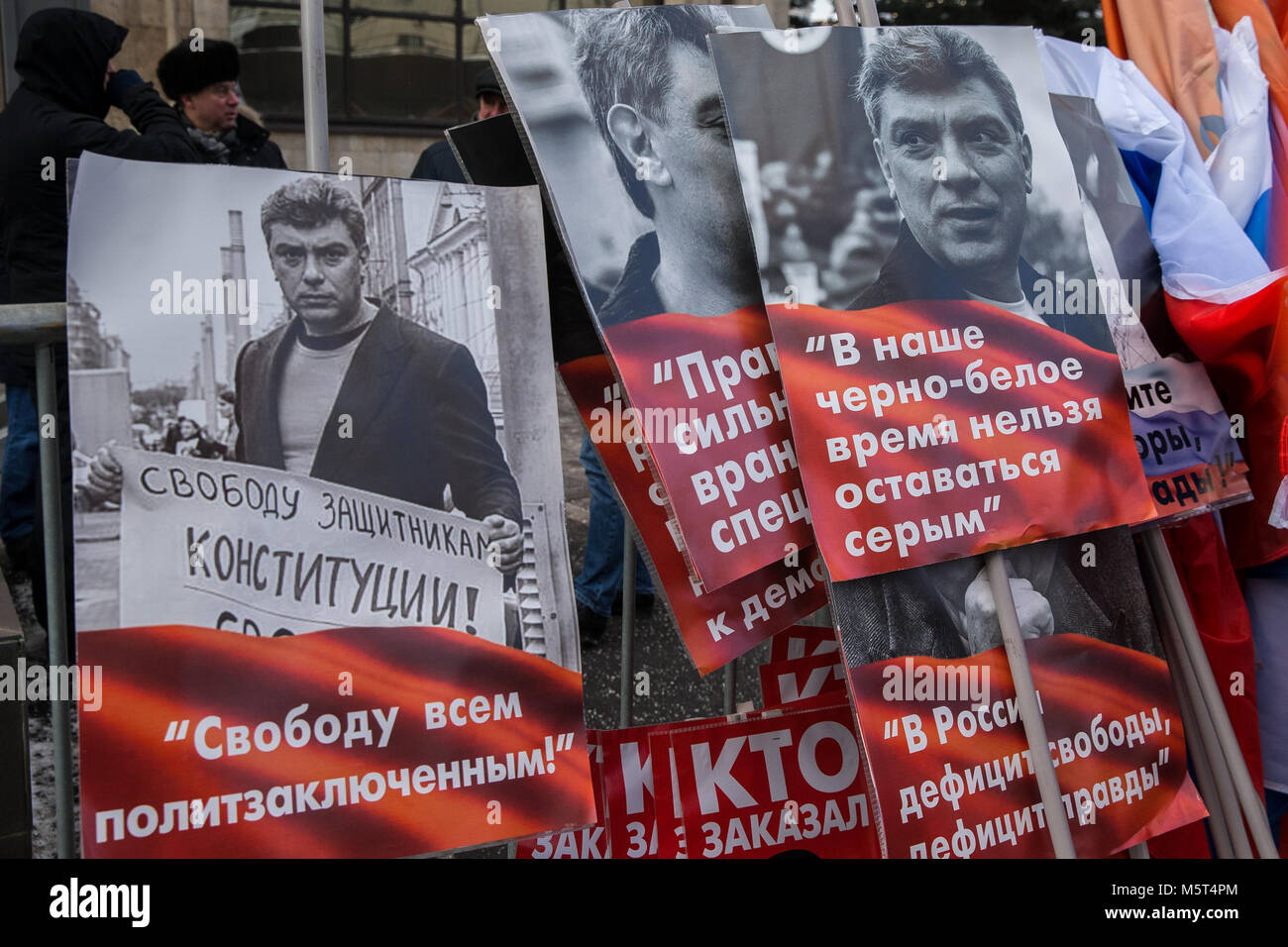 Moscow, Russia. 25th February 2018. Posters seen during a march in Moscow's Prospekt Akademika Sakharova Street in memory of Russian politician and opposition leader Boris Nemtsov on the eve of the 3rd anniversary of his death. Boris Nemtsov was shot dead on Bolshoi Moskvoretsky Bridge in the evening of February 27, 2015. Credit: Victor Vytolskiy/Alamy Live News Stock Photo