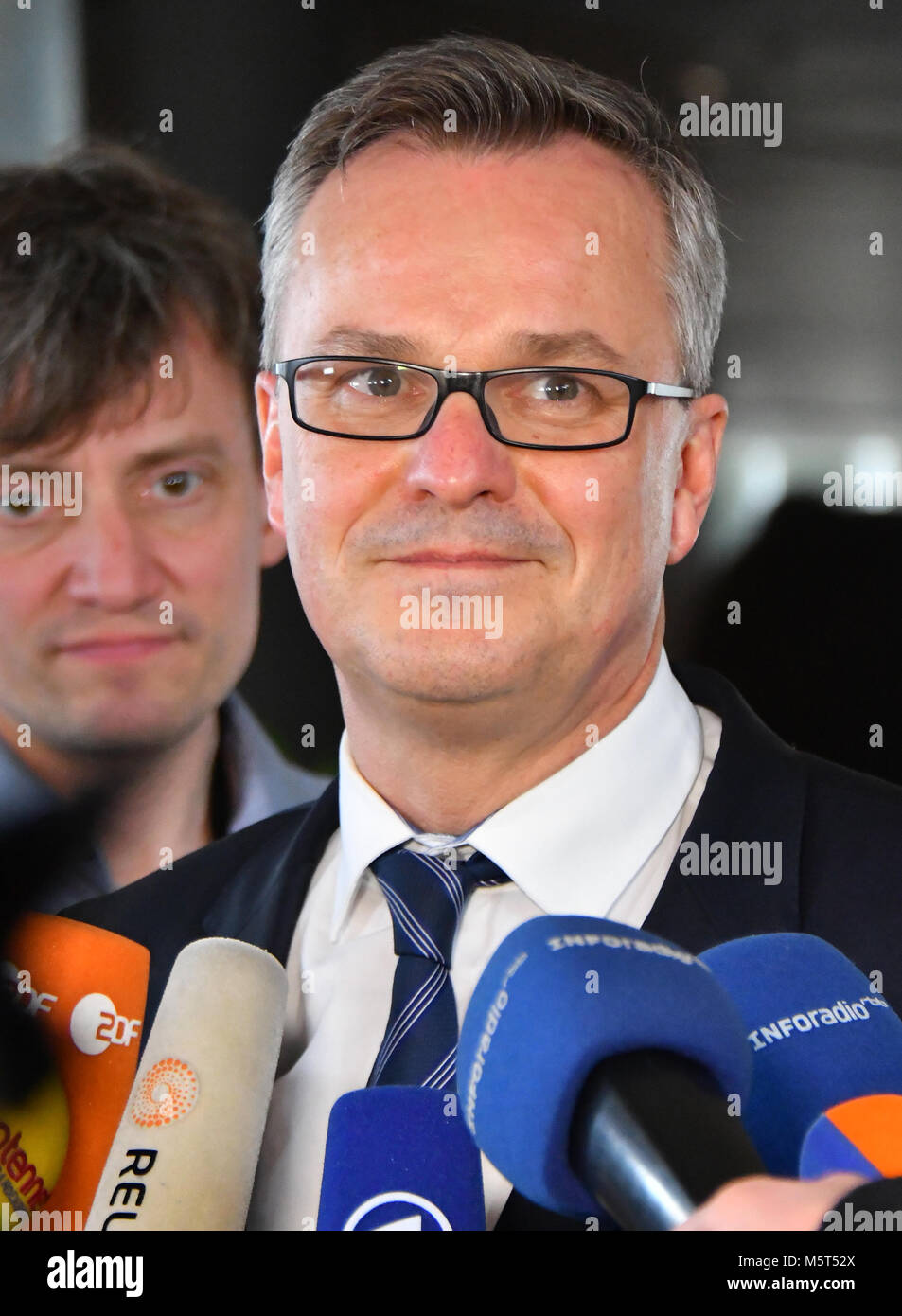 26 February 2018, Germany, Potsdam: State secretary at the German Interior Ministry, Hans-Georg Engelke, delivers a statement to the press at the beginning of the first round of negotiations concerning the salaries of public service sector employees. Public sector unions are demanding a pay increase of six percent. Photo: Bernd Settnik/dpa-Zentralbild/dpa Stock Photo