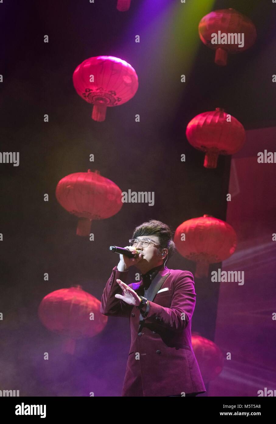 (180226) -- LOS ANGELES, Feb. 26, 2018 (Xinhua) -- Chinese singer Wang Zhengliang performs during 'Cultures of China, Festival of Spring' gala, at the Cal State LA Luckman Theatre in Los Angeles, the United States, Feb. 25, 2018. A Spring Festival gala was staged in here Sunday night for overseas Chinese and Americans to co-celebrate the Chinese Lunar New Year. (Xinhua/Zhao Hanrong) (zjl) Stock Photo