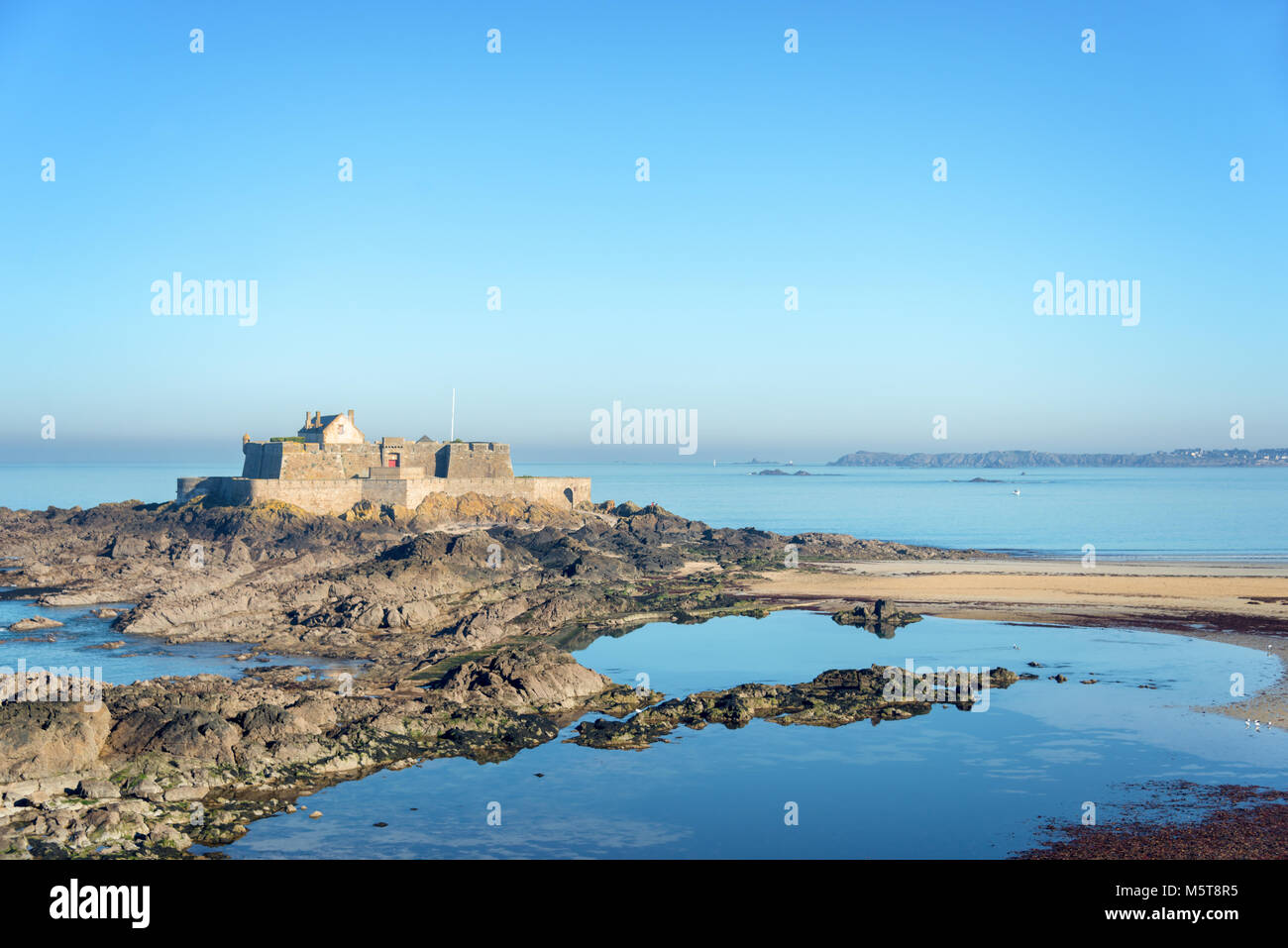Fort National at low tide in Saint Malo, Brittany, France Stock Photo