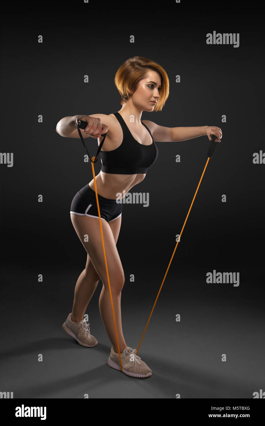 Woman resistance band attractive hi res stock photography and