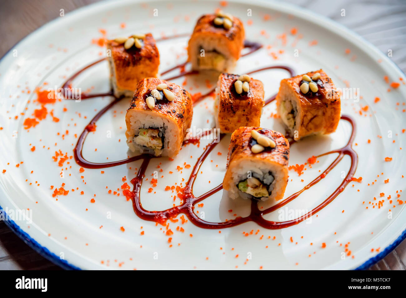 Traditional japanese sushi rolls in restaurant Stock Photo - Alamy