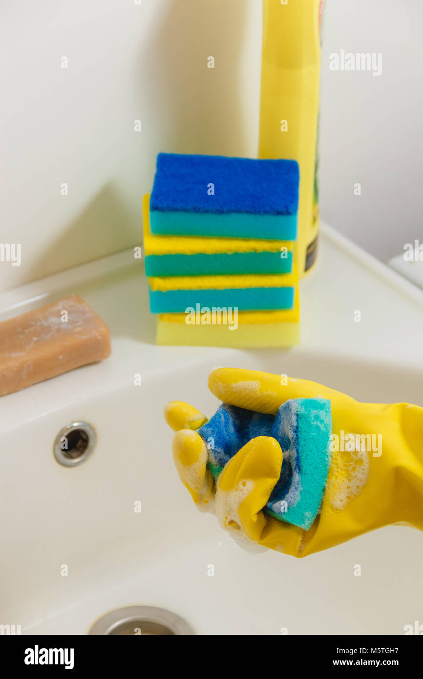 Cleaning Bathroom with Detergent in Yellow Rubber Gloves with Blue ...