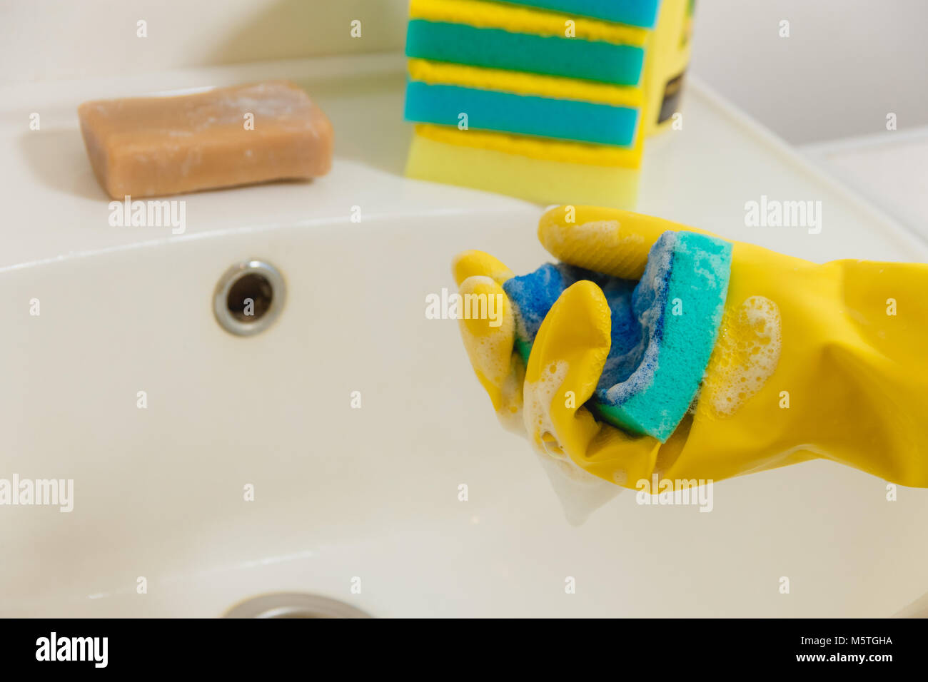 Cleaning Bathroom with Detergent in Yellow Rubber Gloves with Blue ...