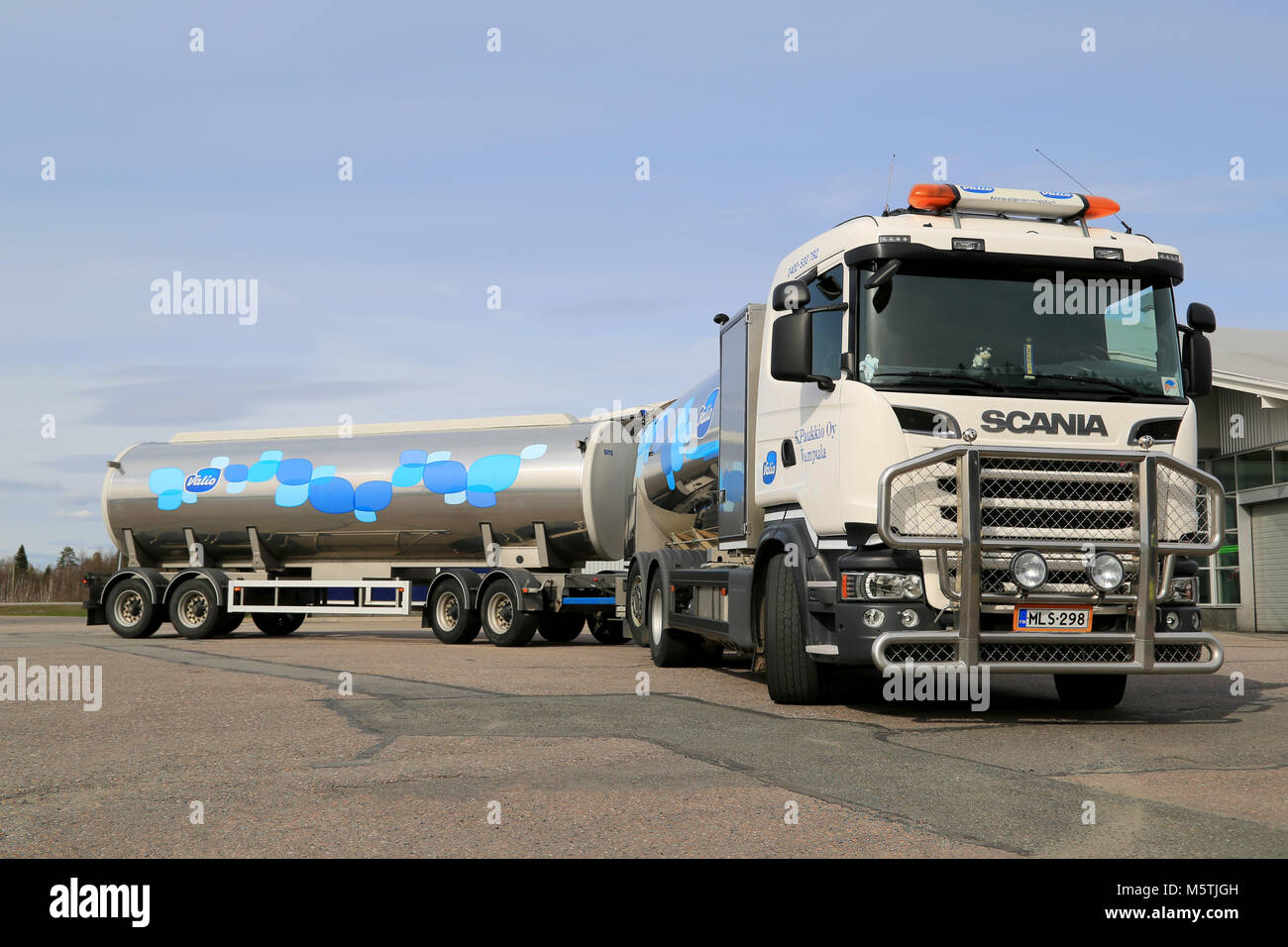FORSSA, FINLAND - APRIL 25, 2015: New Scania R500 V8 milk truck parked. Valio milk trucks collect ca 1,9 Billion liters of milk in one year. Stock Photo